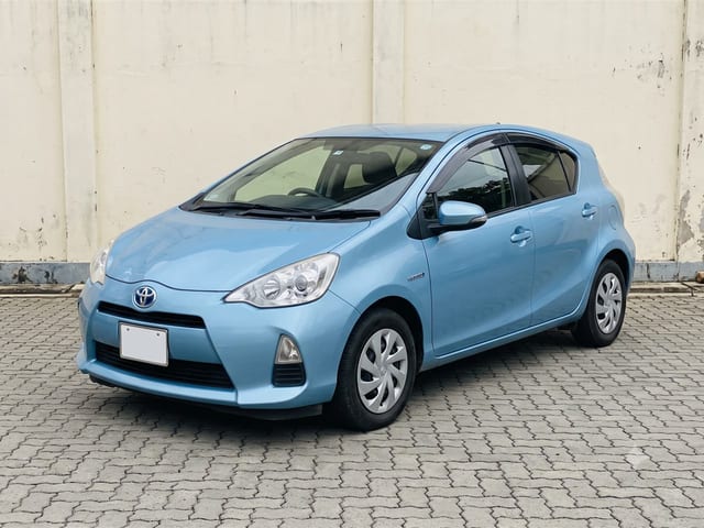 Light blue Toyota Aqua 2014 hatchback